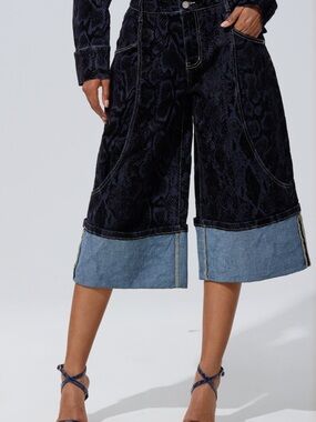 AKIRA Feels Like Money Navy Snake-Print Wide Crop Denim Bermudas